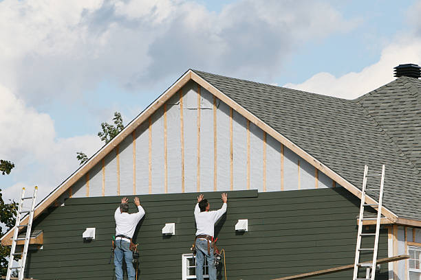 Professional Siding Installation technician working in Lorton, VA